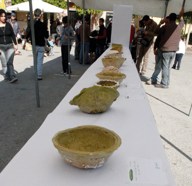 Taste of Beirut, 2008. A “green line” of bread bowls was lined up at the farmer’s market in Beirut. The handmade bowls were served to market-goers with cedar honey (referencing the Cedars of Lebanon) and ricotta (made from yoghurt – from which the country “land of yoghurt” got its name)