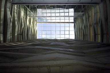 The conference rooms overlook a glazed atrium