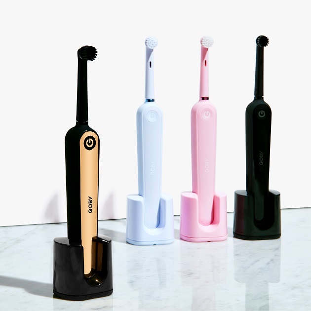 goby four electric toothbrushes in stands in range of colours ICON