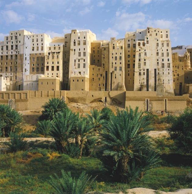 Shibam in Yemen – the city’s fortified perimeter has given rise to an urban landscape of tall mud-brick towers. Image: Alamy. 