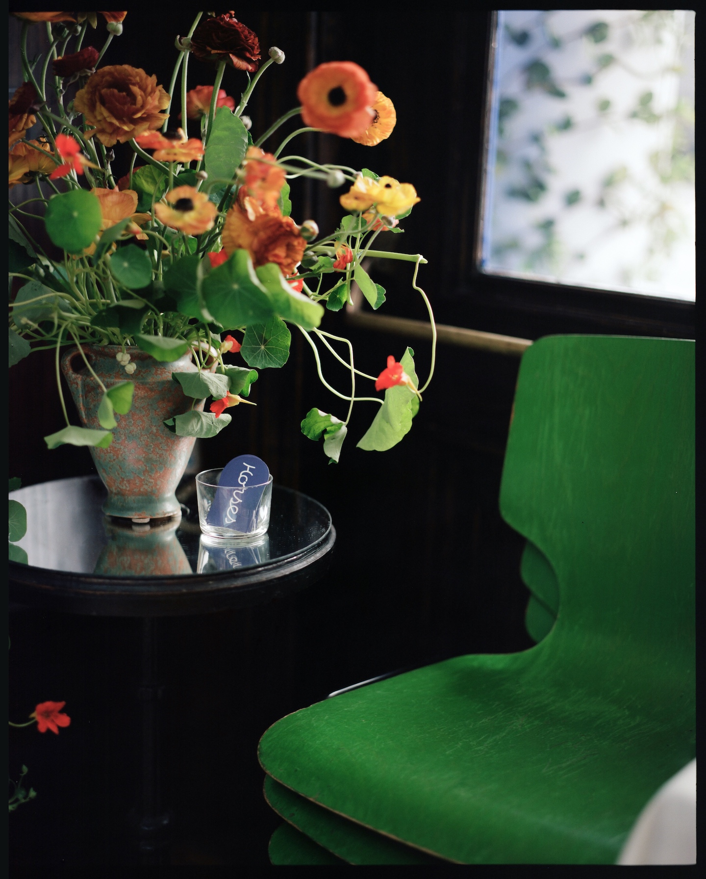 Horses LA interior flowers green chairs