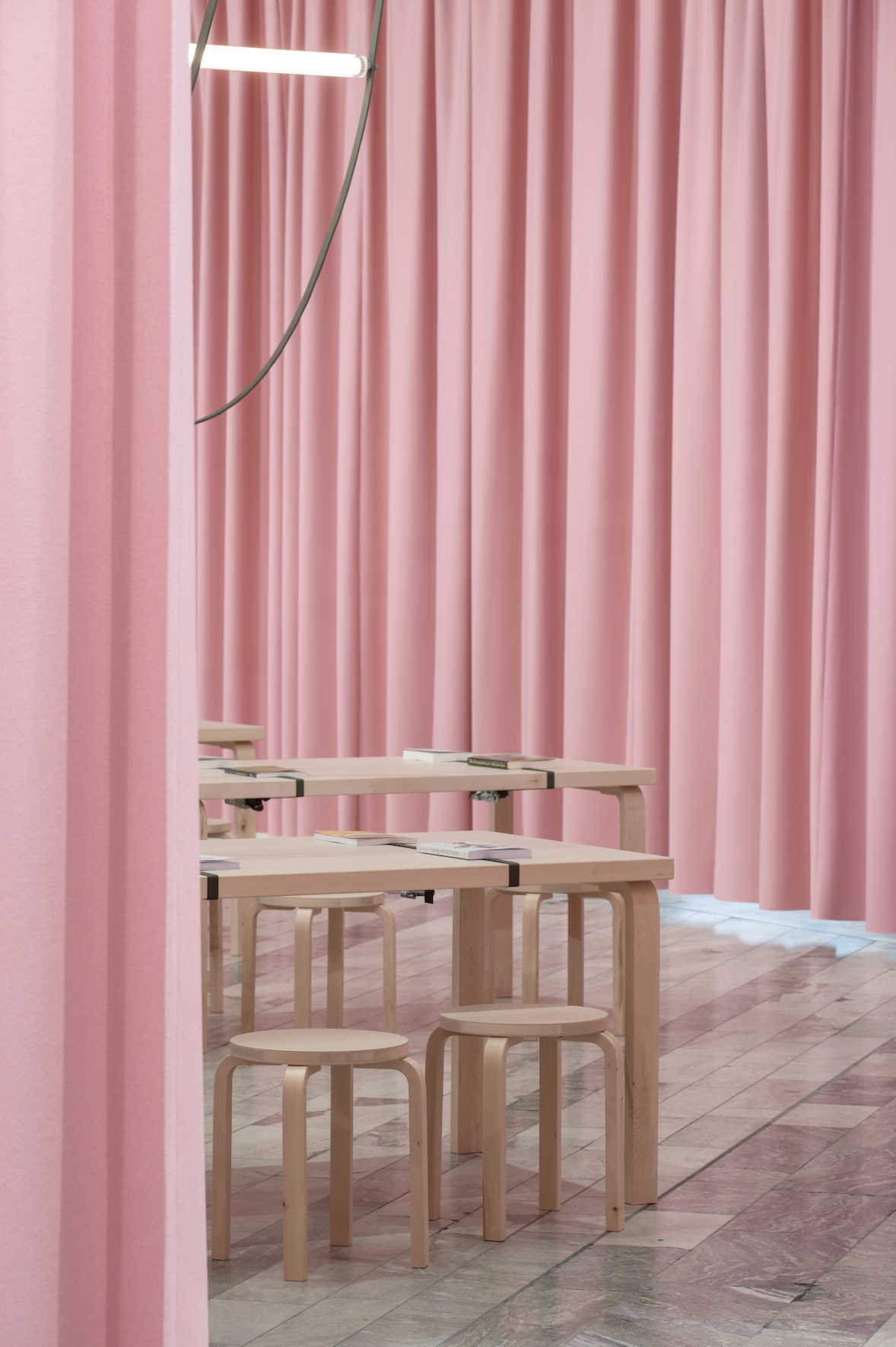 Reading Room Formafantasma pink curtains Flos light Artek stools Stockholm Furniture Fair